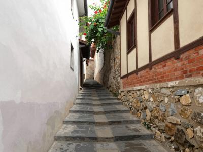 AI-generated illustration of The Narrowest Street in the World (Ulica Klančić)