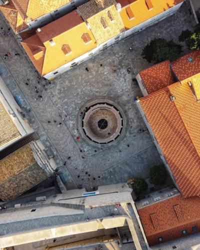 Aerial shot of Dubrovnik's Old Town featuring Large Onofrio's Fountain.