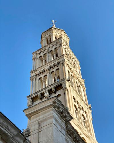 Stunning view of Saint Domnius Cathedral's bell tower in Split, Croatia showcasing romanesque architecture.