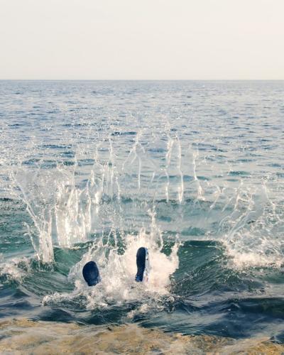 Dive into the vibrant Adriatic Sea with this dynamic splash scene from Pula, Croatia.