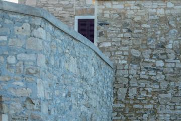 Captivating view of historic stone architecture in Novigrad, Croatia highlighting traditional design.
