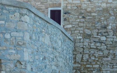 Captivating view of historic stone architecture in Novigrad, Croatia highlighting traditional design.