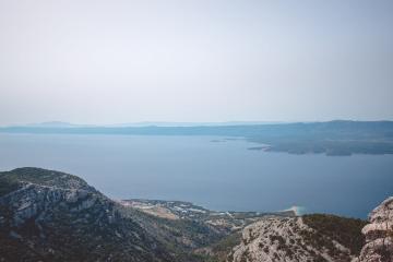Free Breathtaking aerial view of Croatia's Adriatic coastline and mountains. Stock Photo
