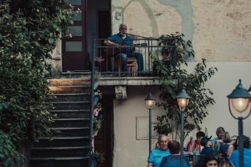 Charming outdoor dining in Croatia with live music and night ambiance.