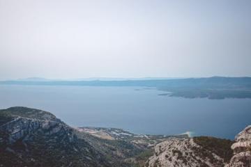 Free Breathtaking aerial view of Croatia's Adriatic coastline and mountains. Stock Photo