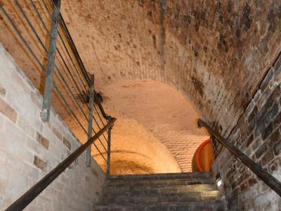 a set of stairs leading up to a tunnel