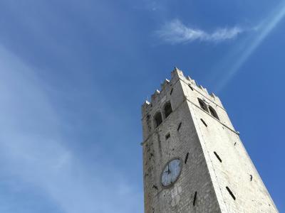 brown concrete tower under blue sky during daytime