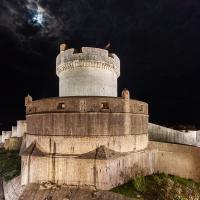 The floodlit Minčeta tower on Dubrovnik's city walls at night