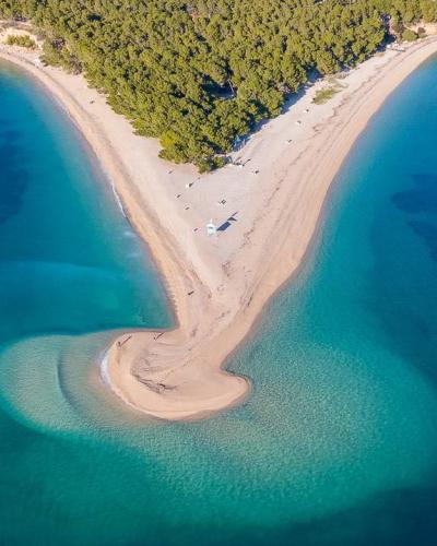 The Zlatni Rat beach spit at Bol on the island of Brač