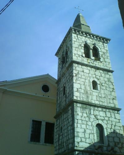 The stone bell tower of St. Andrew's Church in Bakar