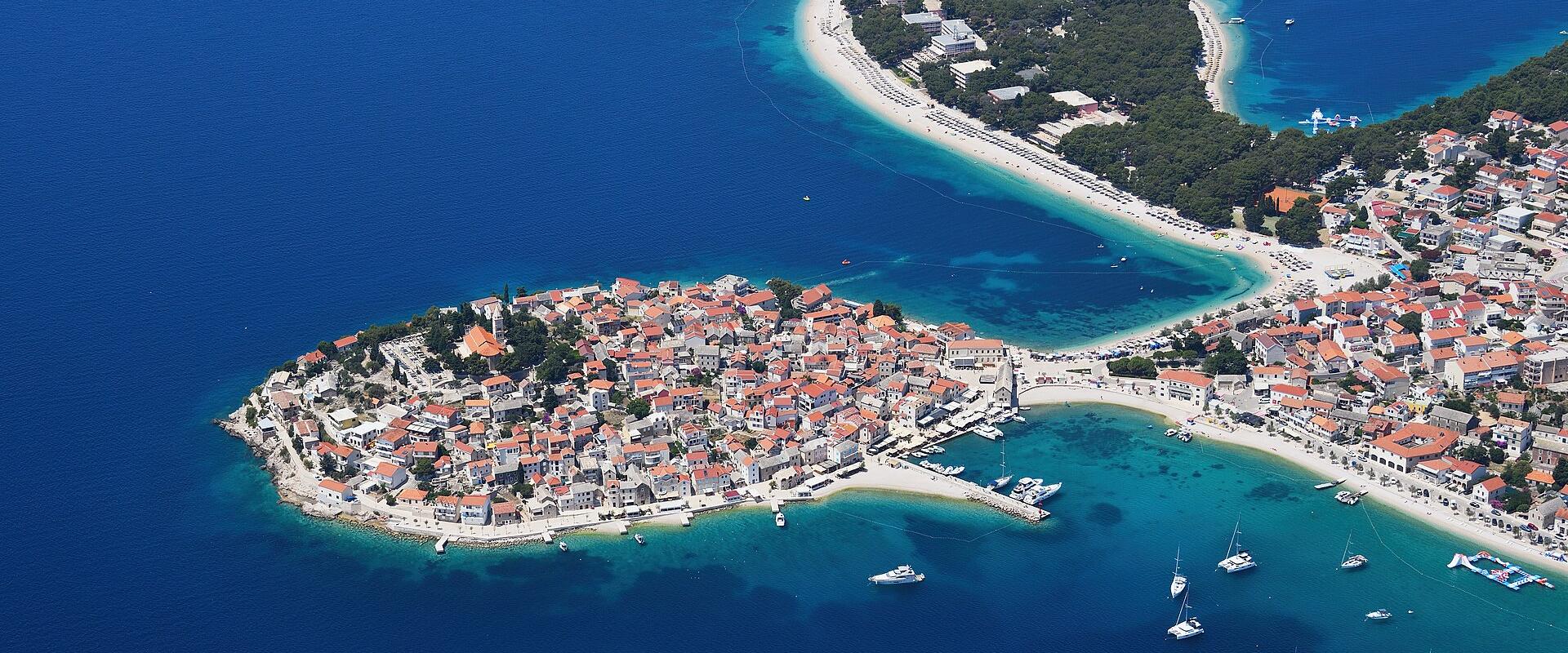 Aerial view of the Primošten old town peninsula and its neighbouring beaches on the Adriatic