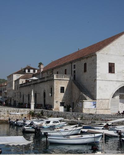 The Arsenal building on the harbour of Hvar Town, whose upper floor houses the 1612 Hvar public theatre