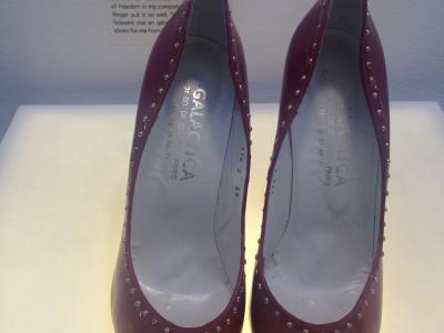A pair of shoes and its story, one of the exhibits at the Museum of Broken Relationships